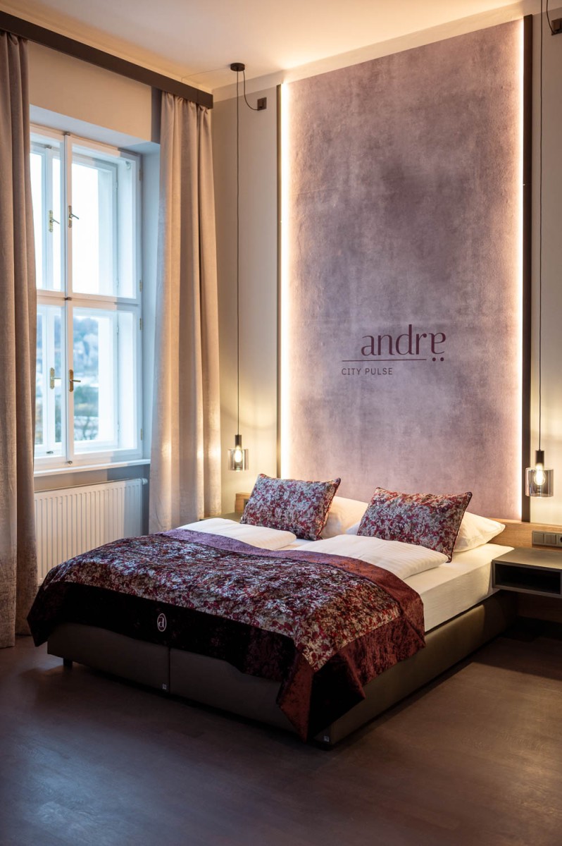 Modern room at HOTEL andrae, Salzburg, with stylish decor and a cozy atmosphere