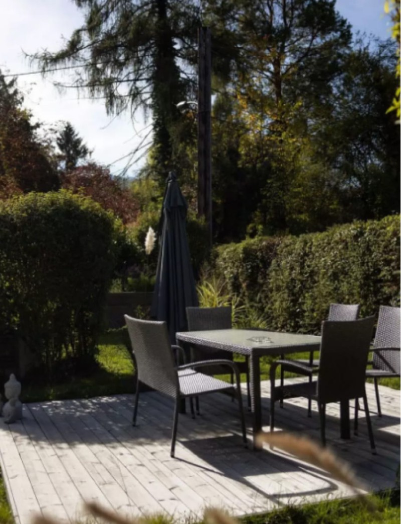 Garden area at HOTEL max70 with cozy seating and a calm atmosphere